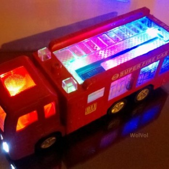 WolVol Electric Fire Truck Toy with Lights, Sirens and Sound (“fire alarm, lets go”, “out of my way”…), goes around and changes directions on contact (Battery Powered) – Great Gift Toys for Kids image